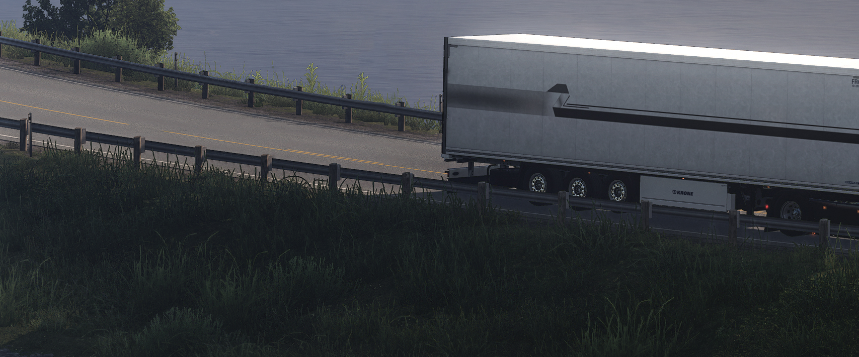 A ThermoExpress trailer on a foggy lakeside road
